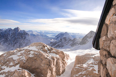 Scenic view of snowcapped mountains against sky