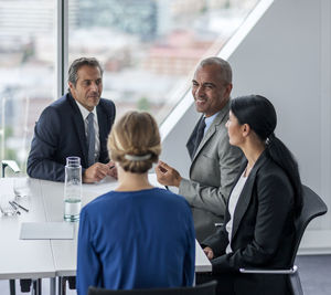 Businessman and businesswomen at meeting