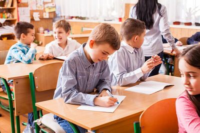 Students studying in classroom