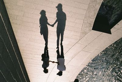 Upside down image of couple standing on promenade