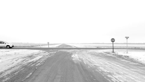 Cropped vehicle on snow covered landscape