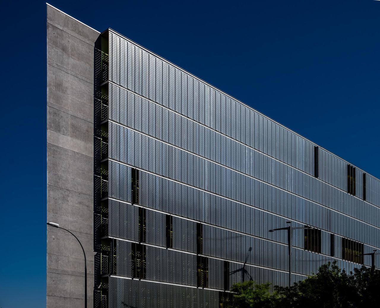 MODERN BUILDING AGAINST SKY