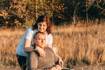 Loving caucasian couple in countryside. gentle hugs, a concept for valentine's day
