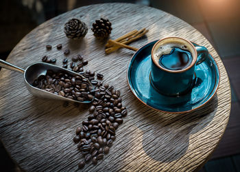 High angle view of coffee cup on table