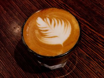 Close-up of cappuccino on table