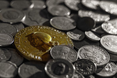 High angle view of coins on table