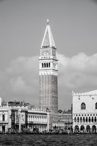 Low angle view of clock tower against sky