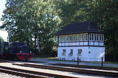 Train on railroad track against sky