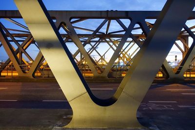 Metallic structure against sky