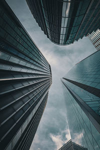 Low angle view of modern buildings against sky