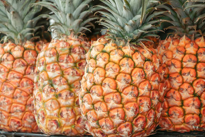 Close-up of pineapple in market for sale
