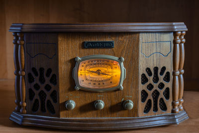 Close-up of telephone booth on table