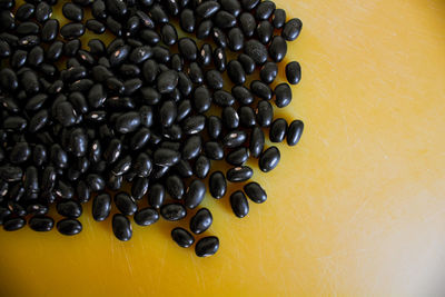 Close-up of coffee beans on table