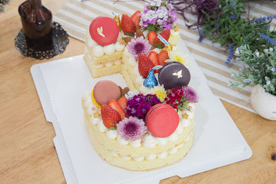 High angle view of cake served on table