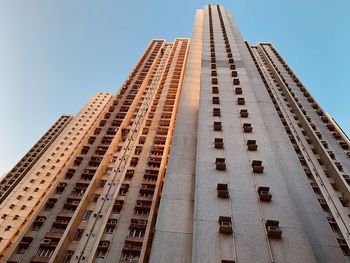 Low angle view of skyscraper against clear sky