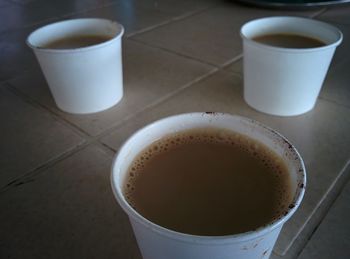 Close-up of coffee cup on table