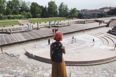 Woman standing at amphitheater