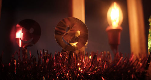 Close-up of burning candles