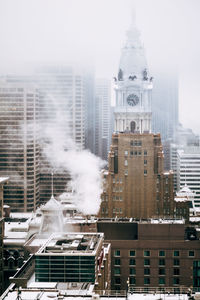 Smoke emitting from factory by philadelphia city hall