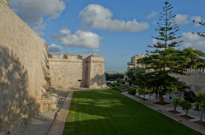 View of historic building against cloudy sky