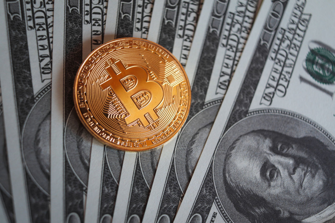 CLOSE-UP OF COINS ON THE TABLE