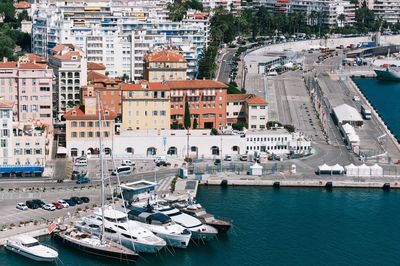 High angle view of boats moored at harbor