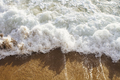 Close-up of waves splashing in sea