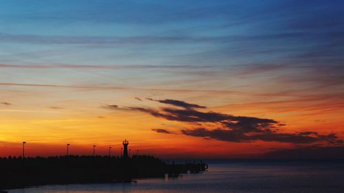 Scenic view of sunset over calm sea