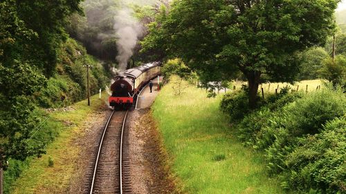 Front view of train on railroad tracks