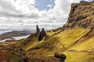 Panoramic view of rocks on land against sky