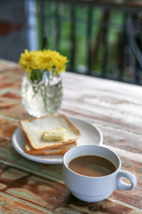 Close-up of coffee served on table