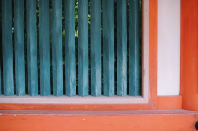 Close-up of closed window on traditional building