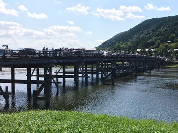 Bridge over river against sky