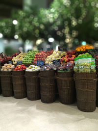 Tilt-shift image of various fruits for sale at market