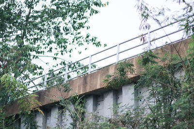 Low angle view of abandoned building against sky