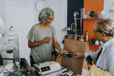 Side view of man working at home