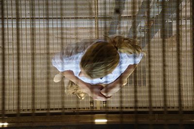 Directly above shot of woman standing at home