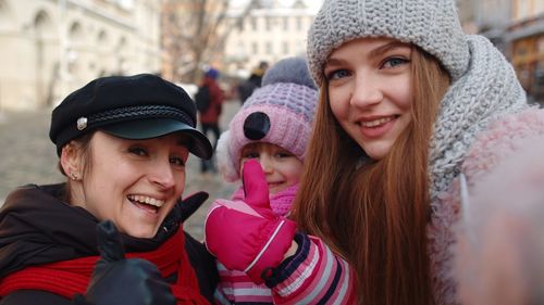 Portrait of smiling people in winter