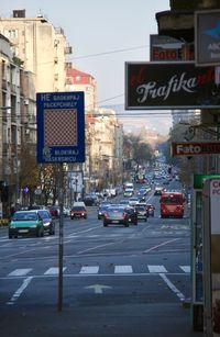 Cars on road in city