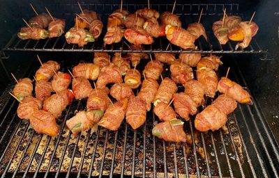 High angle view of meat on barbecue grill