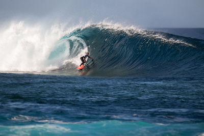 Man surfing in sea