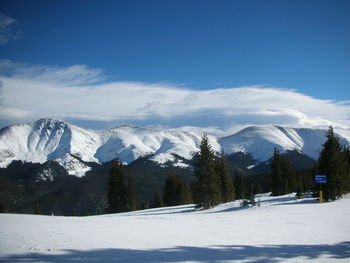 Snowcapped mountains against sky