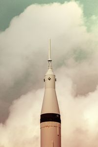 Low angle view of rocket against sky