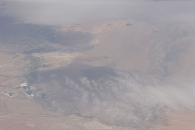 Aerial view of clouds over landscape