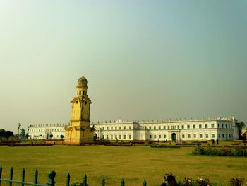 Statue of historic building against clear sky