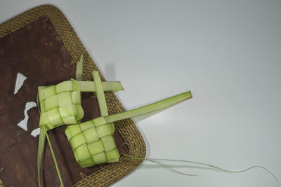 High angle view of fruits in basket on table