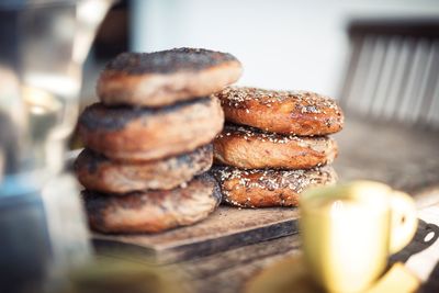 Stacked bagels on table