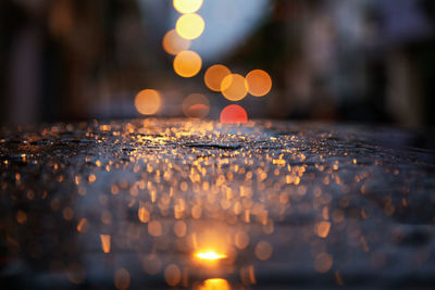 Close-up of illuminated lights at night