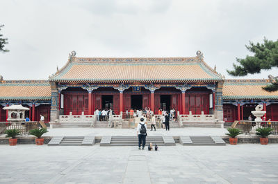 Group of people in front of building