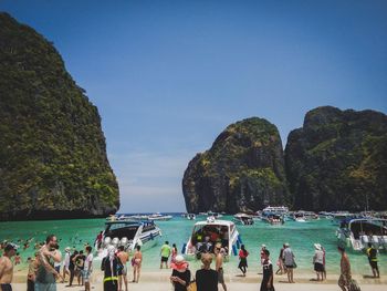 Scenic view of crowded beach